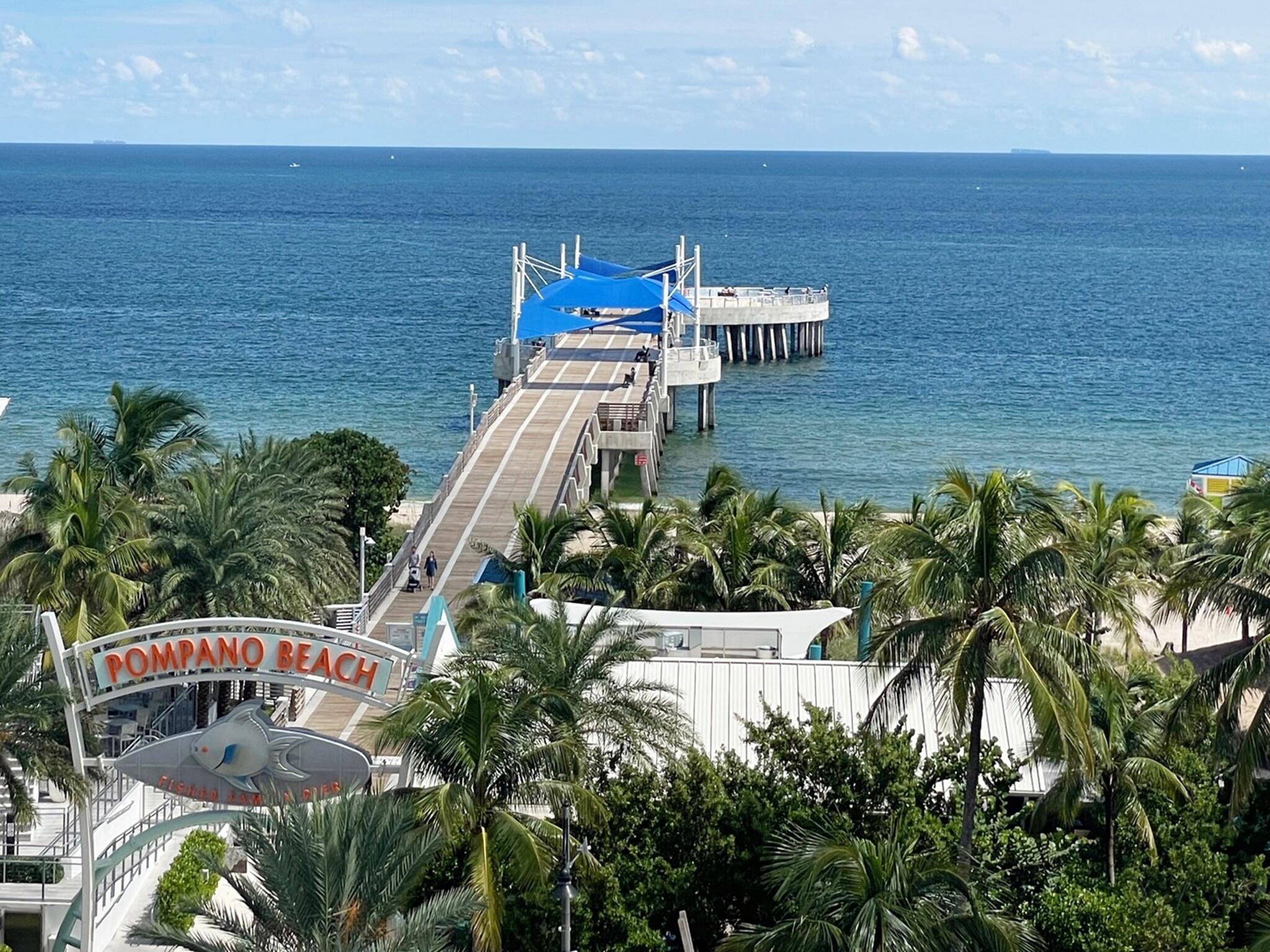 1201 South Riverside Drive, Unit 106 Pompano Beach, FL 33062 - Photo 21 of 28 a view of a chairs and table on the terrace
