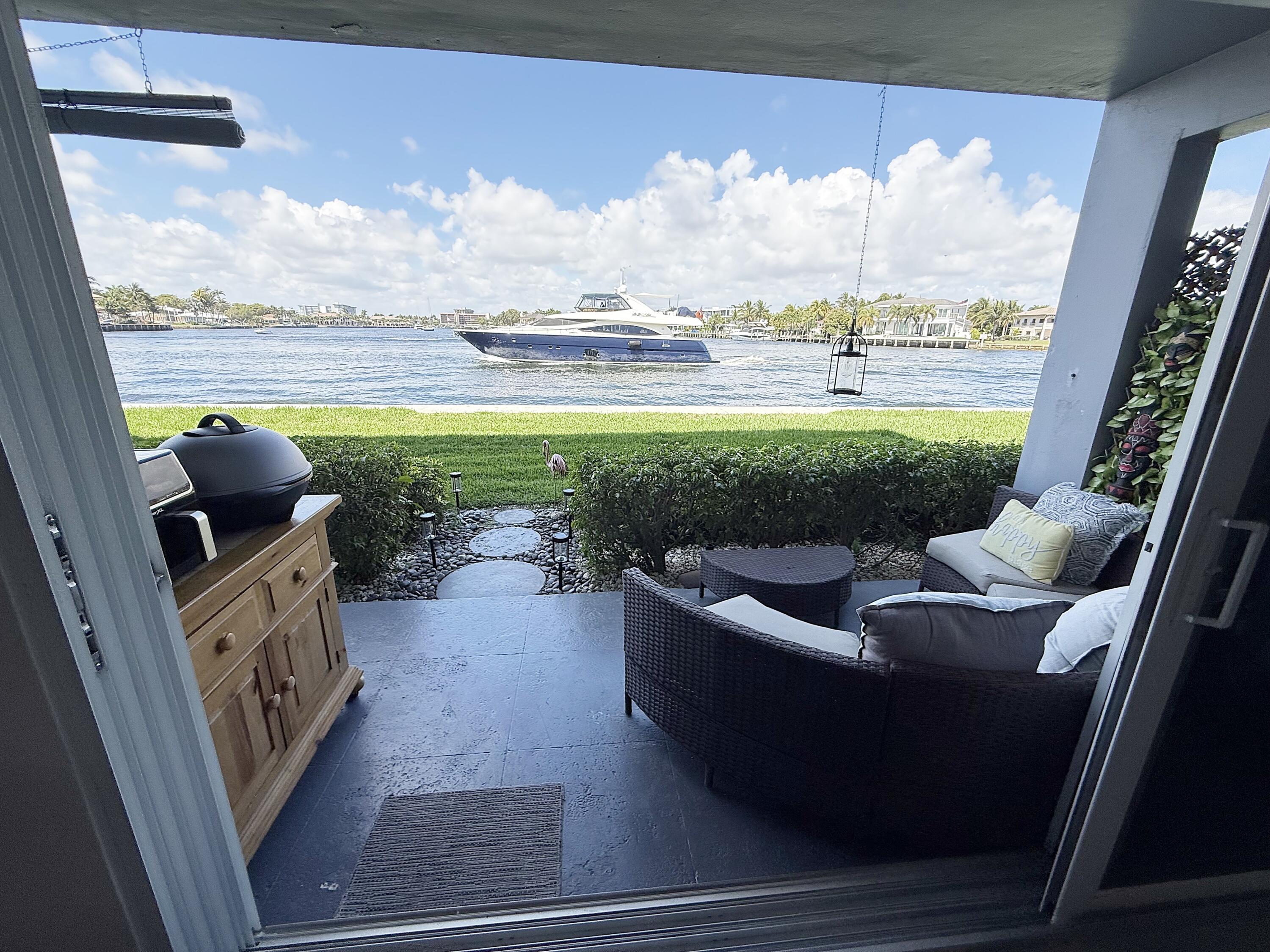 1201 South Riverside Drive, Unit 106 Pompano Beach, FL 33062 - Photo 10 of 28 a view of a couches in the roof deck