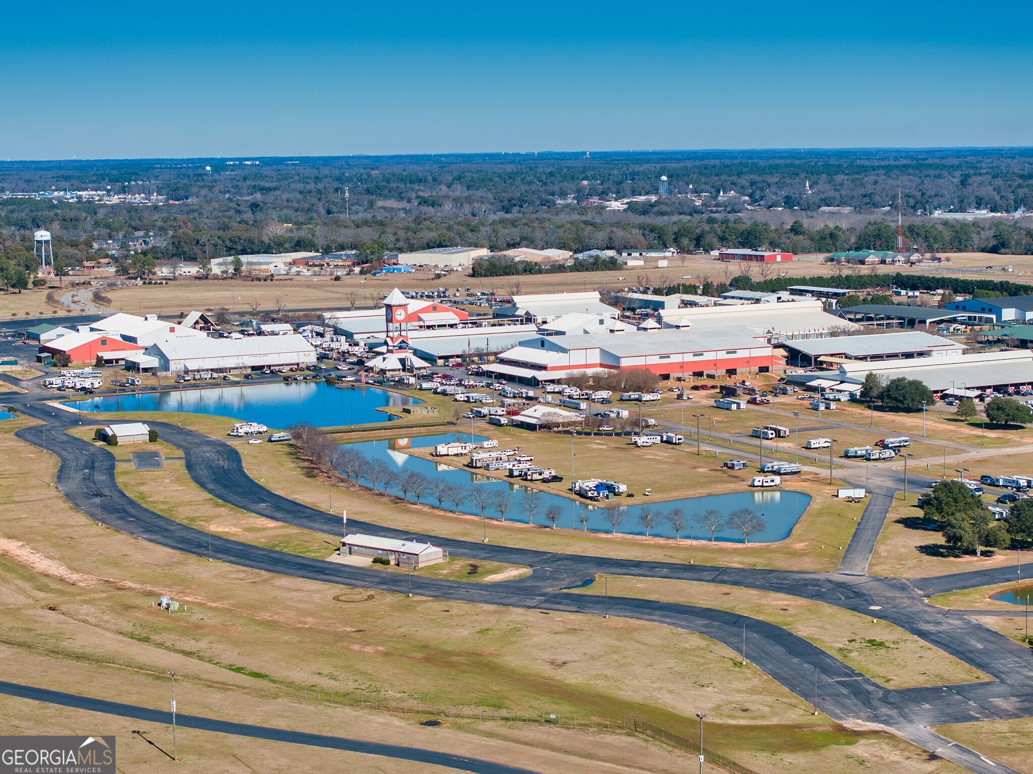 115 Bramblewood Lane Perry, GA 31069 - Photo 23 of 28 a view of a swimming pool with an ocean view