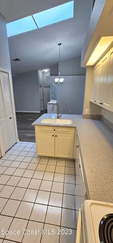 en empty room with wooden floor