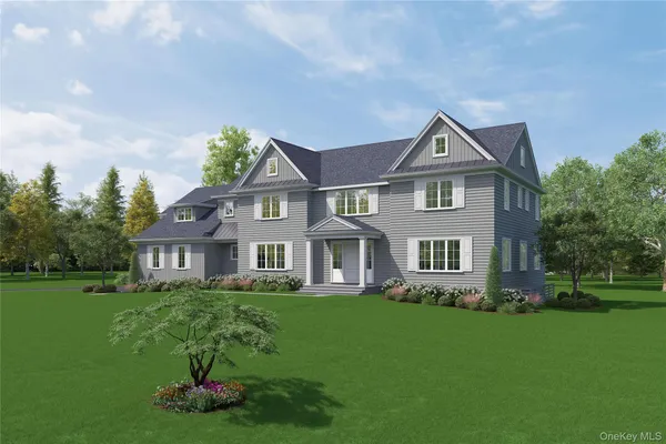 a front view of a house with a garden and porch