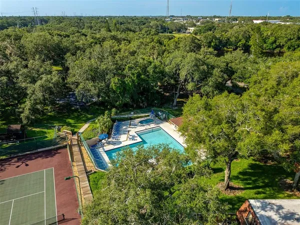 a view of a yard with an outdoor seating