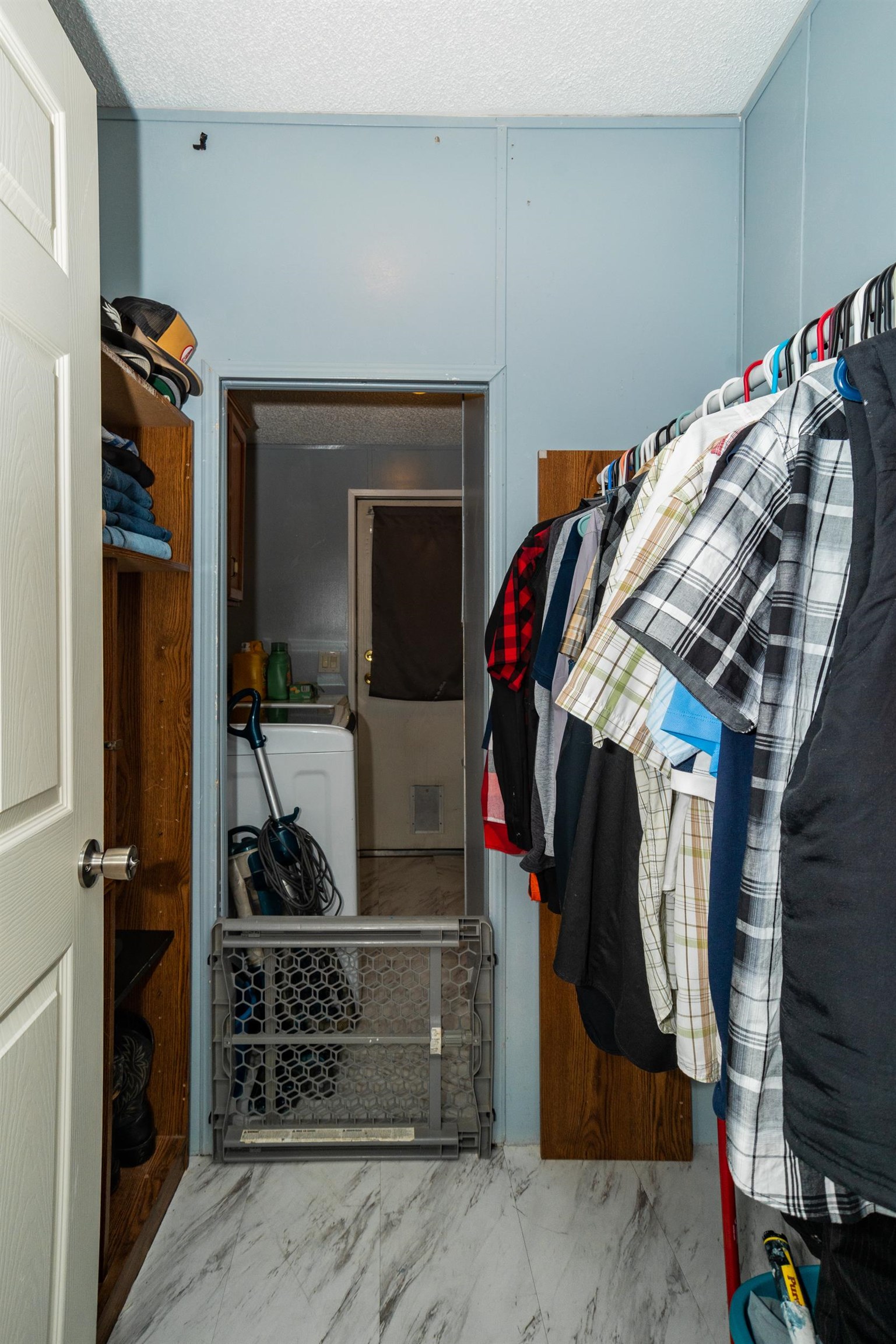 424 32 Road, Unit 265 Clifton, CO 81520 - Photo 12 of 21 a view of walk in closet with clothes and shoes