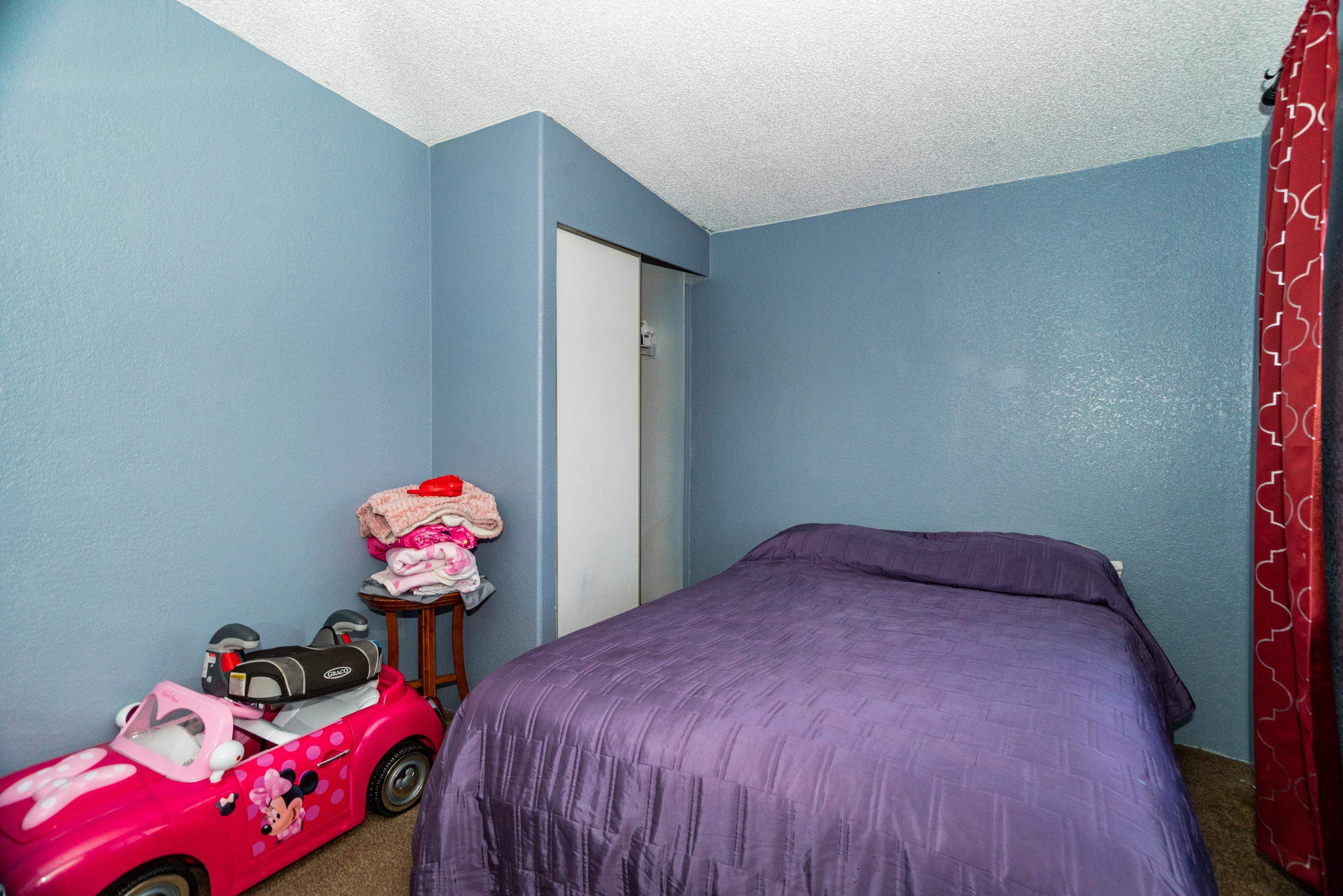 424 32 Road, Unit 265 Clifton, CO 81520 - Photo 15 of 21 a bedroom with a bed and window