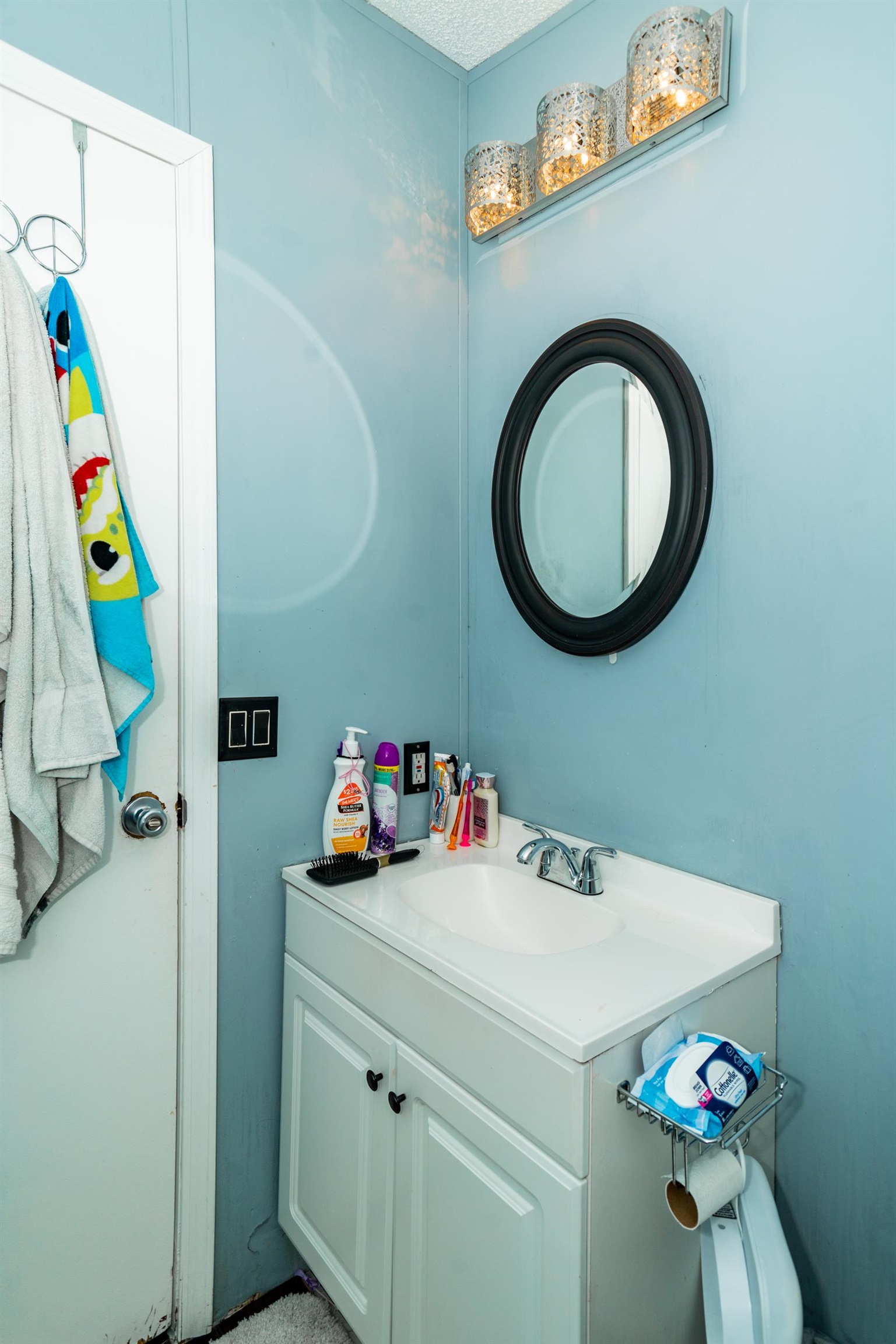 424 32 Road, Unit 265 Clifton, CO 81520 - Photo 18 of 21 a bathroom with a sink a vanity and a mirror