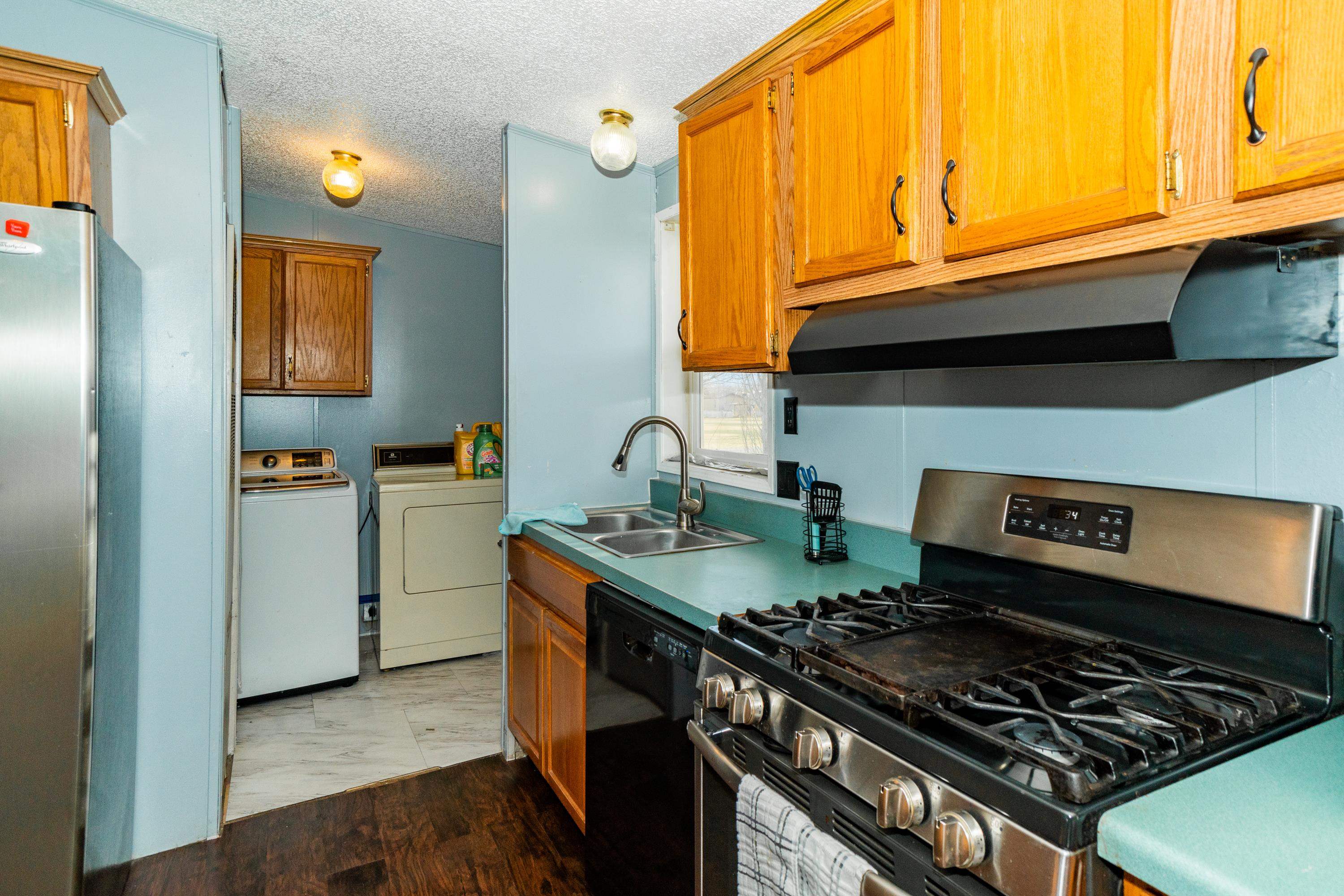 424 32 Road, Unit 265 Clifton, CO 81520 - Photo 4 of 21 a kitchen with granite countertop a stove and a sink