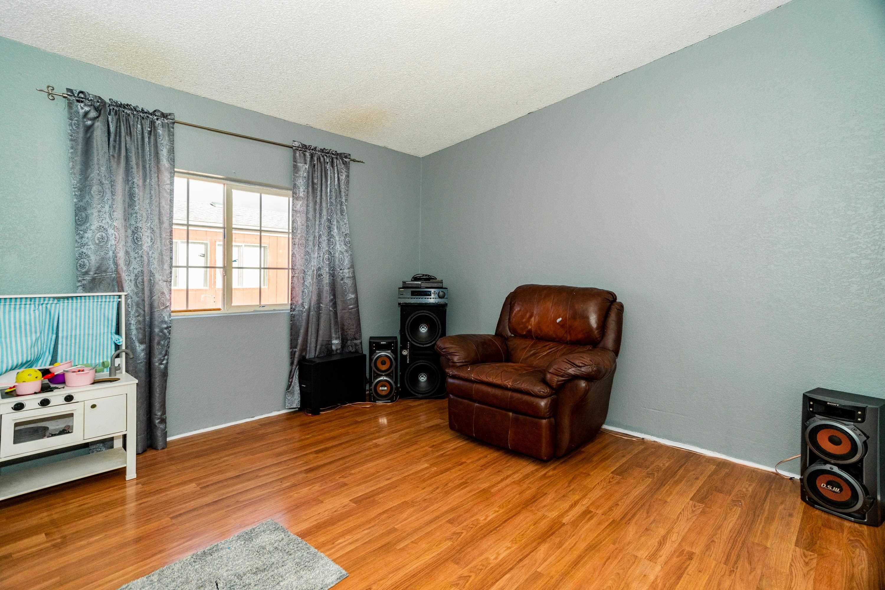 424 32 Road, Unit 265 Clifton, CO 81520 - Photo 7 of 21 a living room with furniture and wooden floor