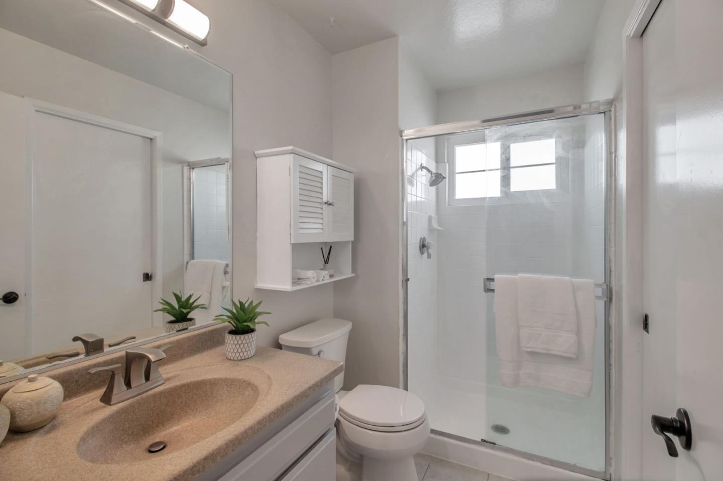 4793 Corte De Cervato San Jose, CA 95136 - Photo 16 of 45 a bathroom with a sink toilet and shower