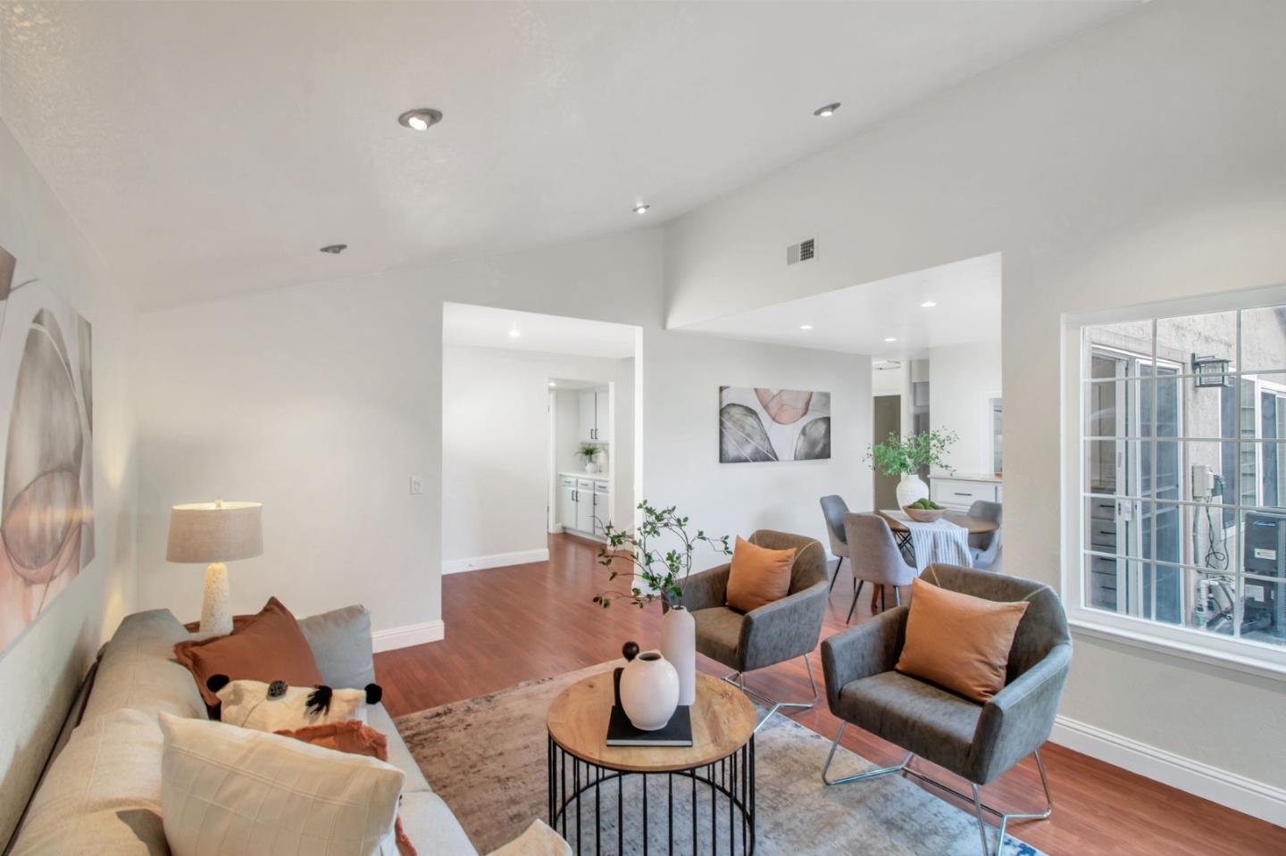 4793 Corte De Cervato San Jose, CA 95136 - Photo 18 of 45 a living room with furniture and a large window