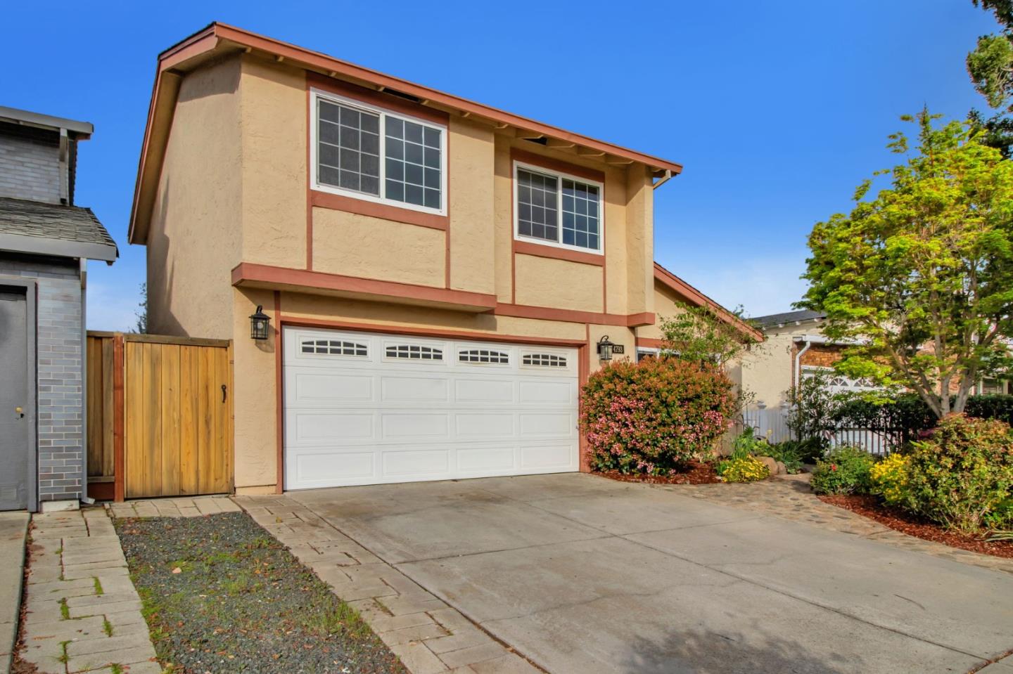4793 Corte De Cervato San Jose, CA 95136 - Photo 2 of 45 a front view of a house with a garage
