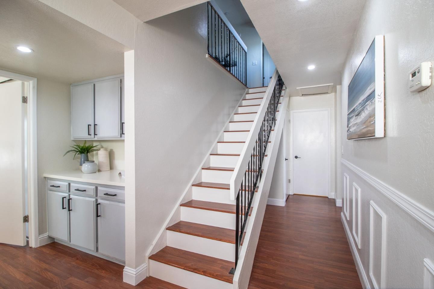 4793 Corte De Cervato San Jose, CA 95136 - Photo 26 of 45 a view of entryway and hall with wooden floor