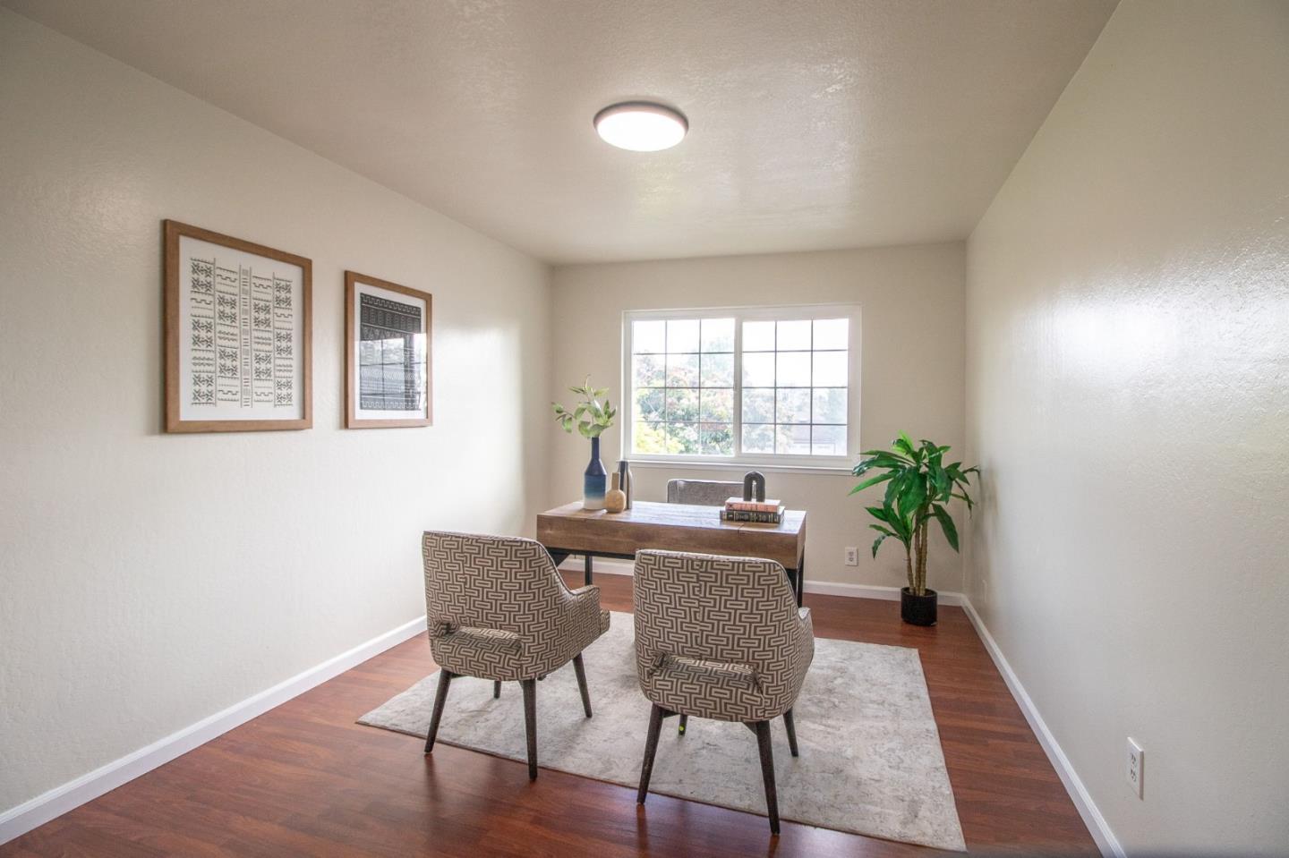 4793 Corte De Cervato San Jose, CA 95136 - Photo 28 of 45 a view of a dining room with furniture and a potted plant
