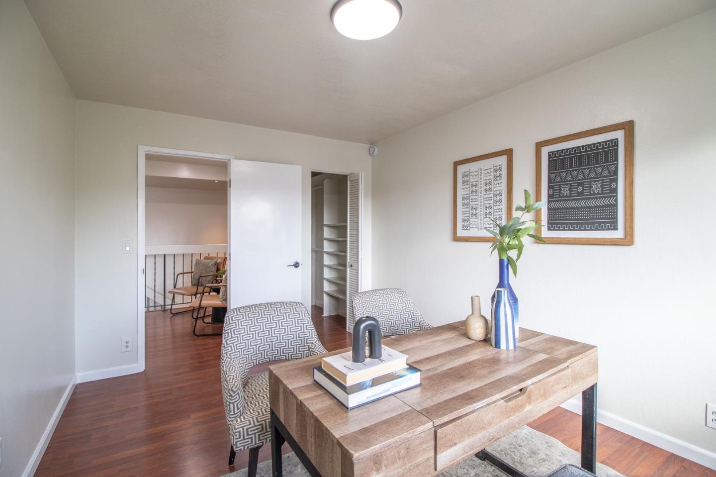 4793 Corte De Cervato San Jose, CA 95136 - Photo 29 of 45 a view of a workspace with furniture and wooden floor