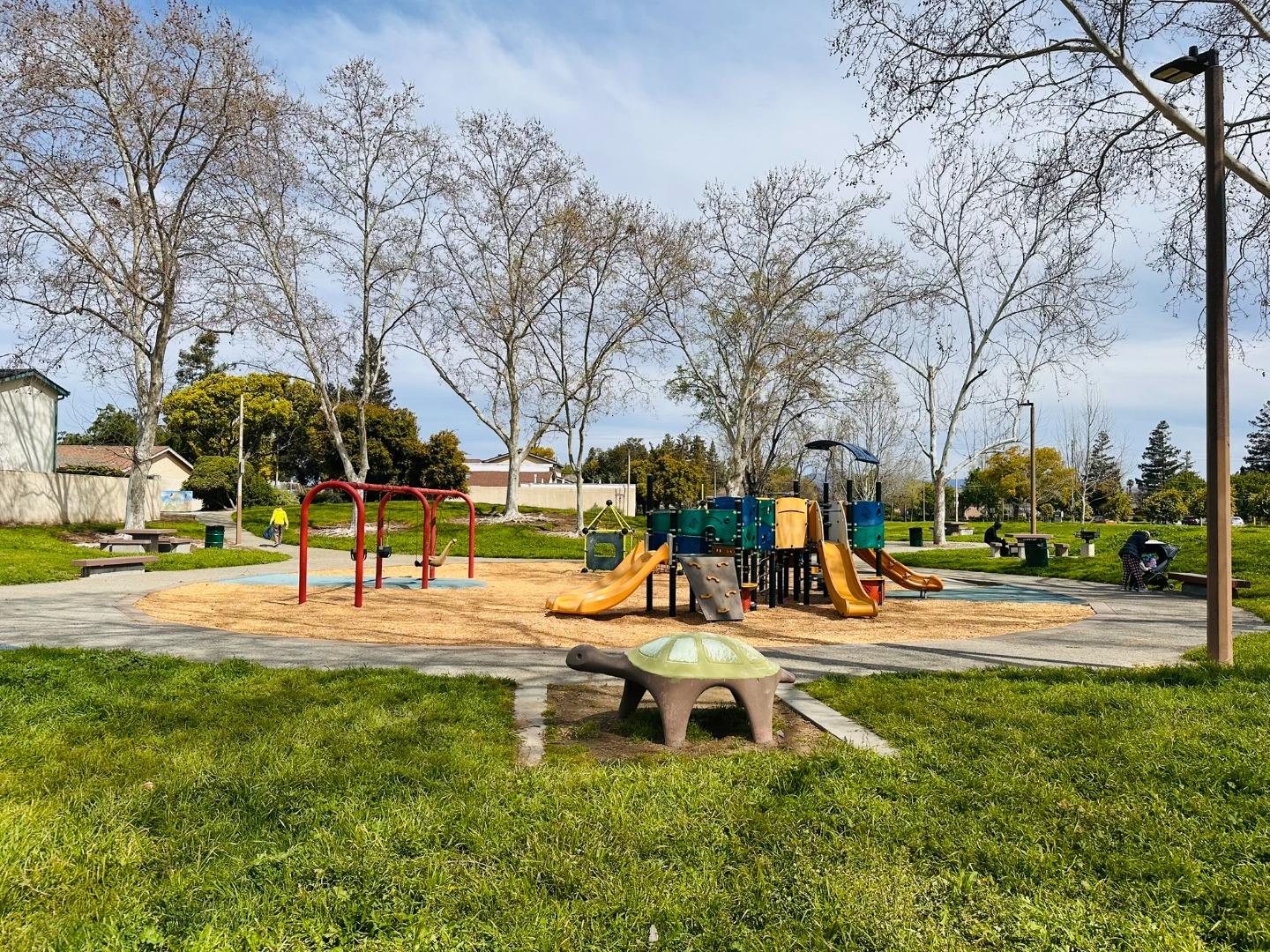 4793 Corte De Cervato San Jose, CA 95136 - Photo 41 of 45 a view of a park with swings and slides