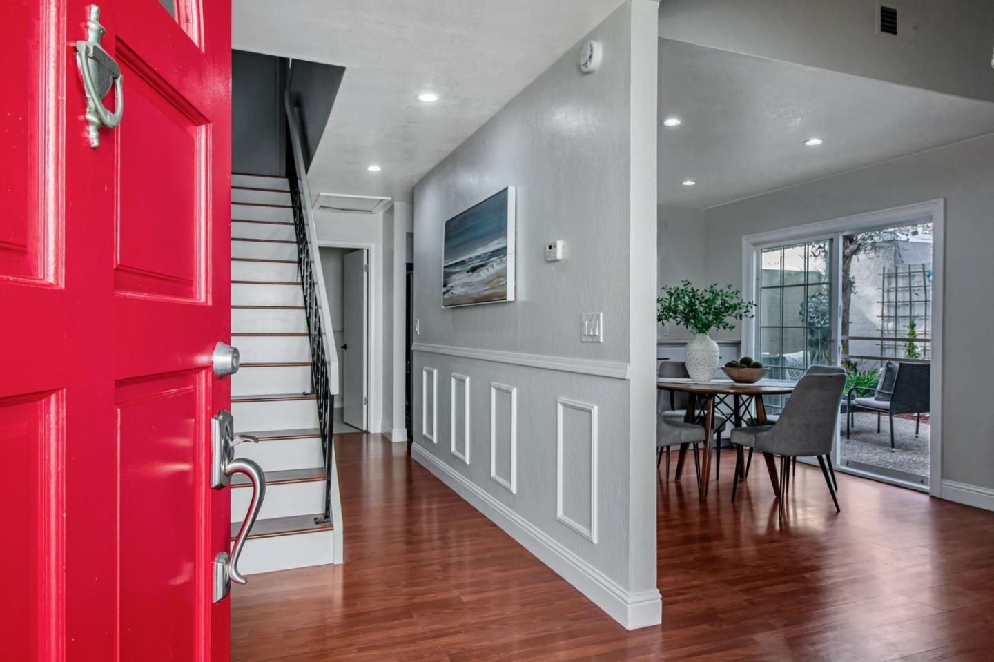4793 Corte De Cervato San Jose, CA 95136 - Photo 6 of 45 a view of a dining room with furniture window and wooden floor