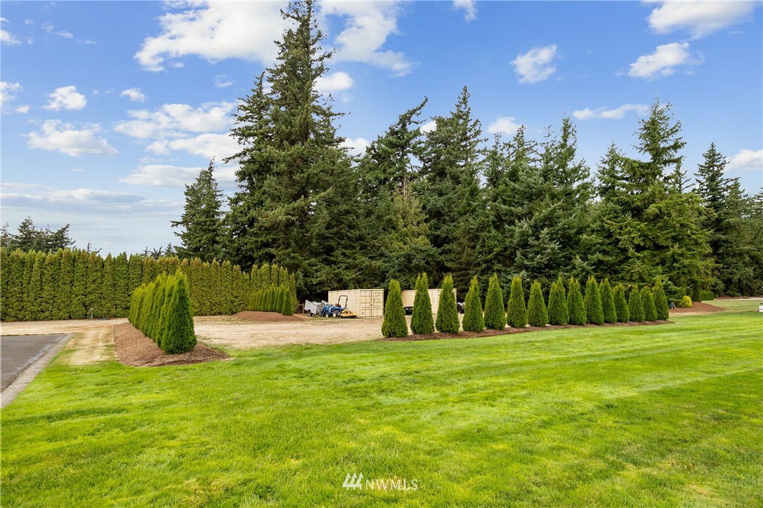 810 East Wiser Lake Road Lynden, WA 98264 - Photo 39 of 40 a huge green field with lots of trees
