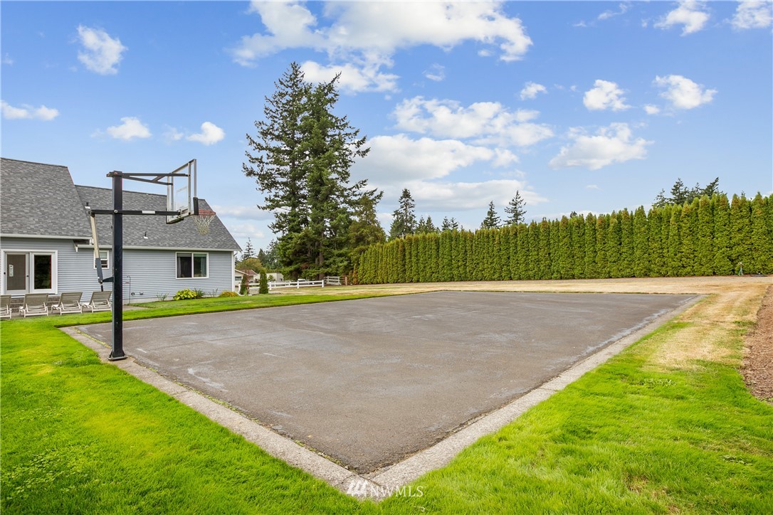 810 East Wiser Lake Road Lynden, WA 98264 - Photo 40 of 40 a front view of a house with a yard and trees