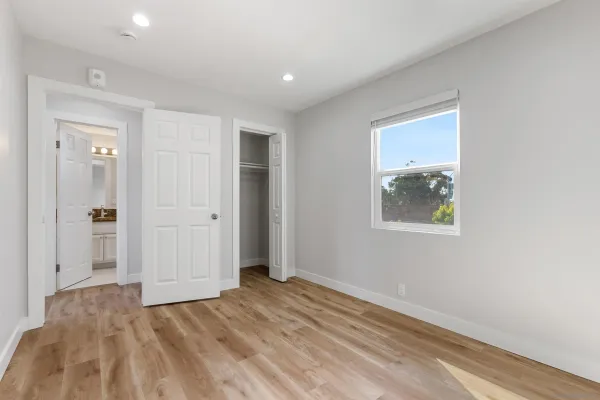 a view of an empty room and window