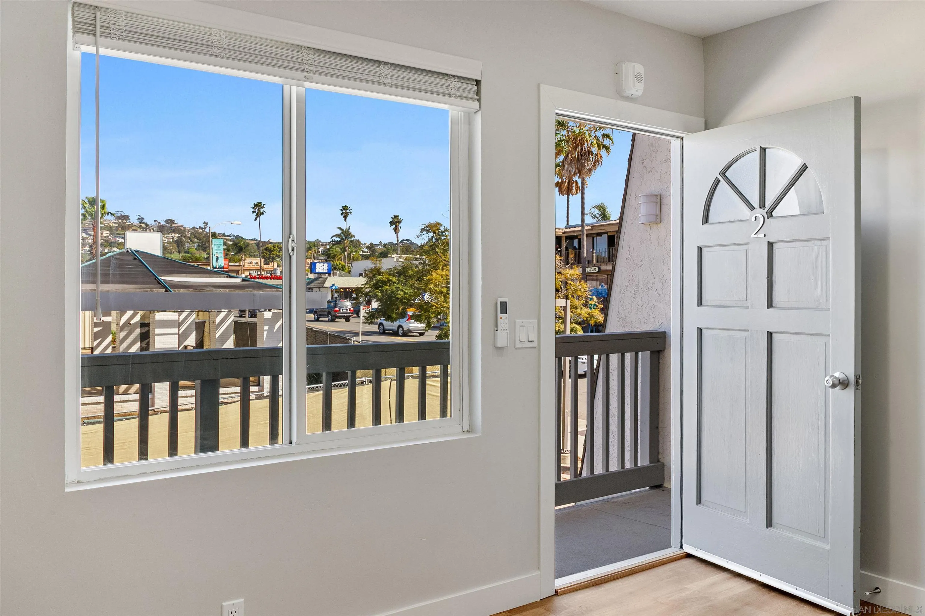 520 Pearl Street, Unit 2 La Jolla, CA 92037 - Photo 4 of 27 a view of staircase with window