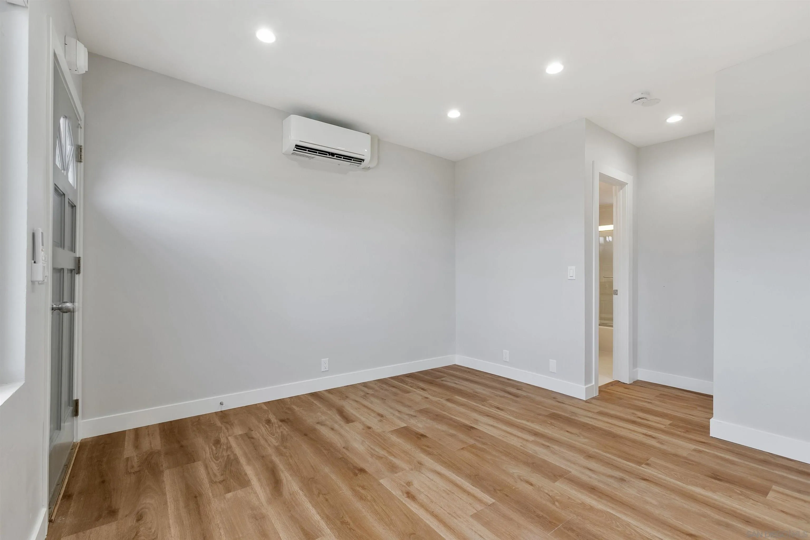 520 Pearl Street, Unit 2 La Jolla, CA 92037 - Photo 10 of 27 wooden floor in an empty room