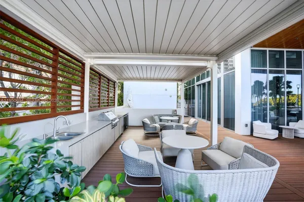 a outdoor space with patio furniture and potted plants
