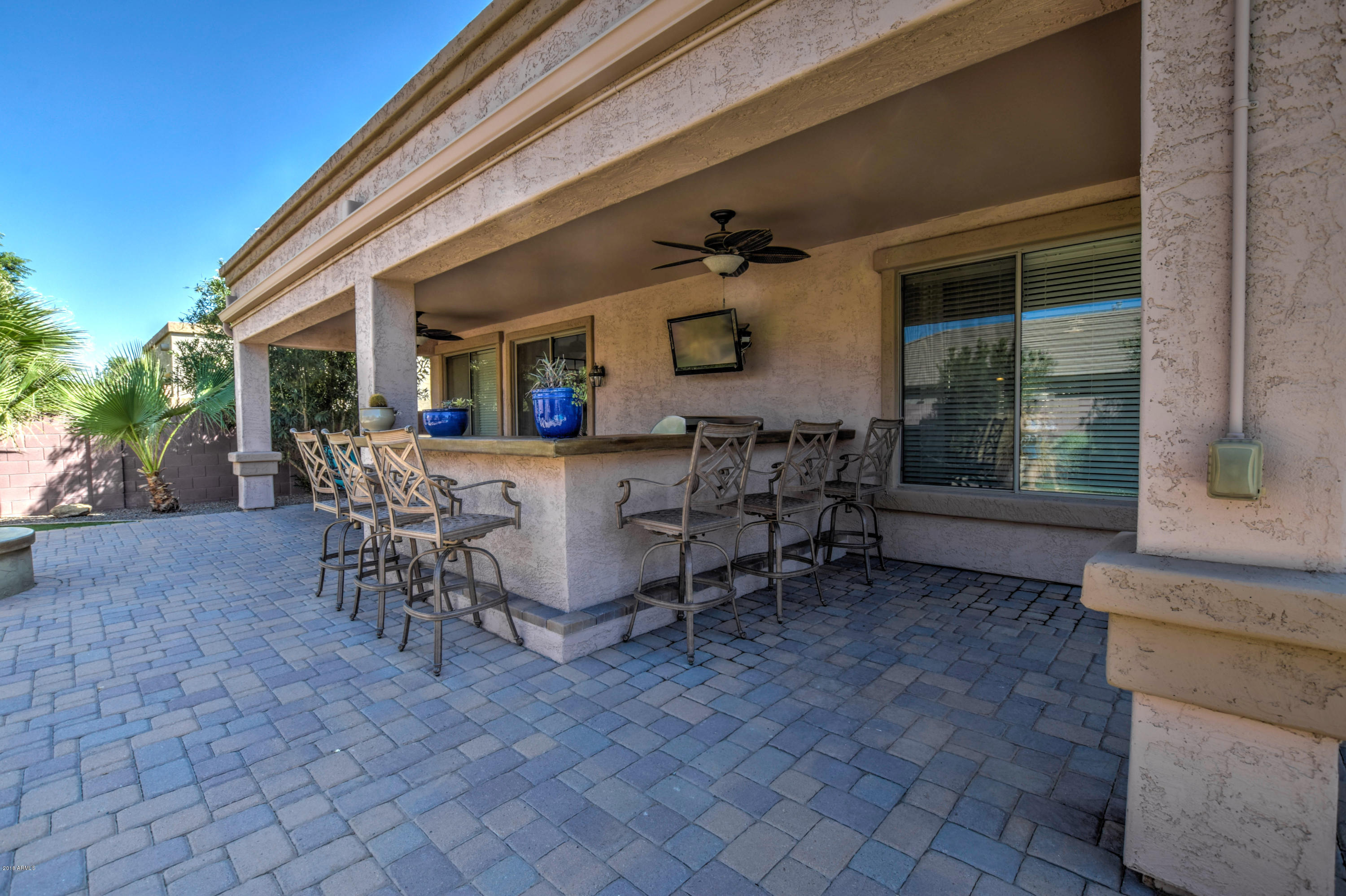 19702 East Thornton Road Queen Creek, AZ 85142 - Photo 64 of 79 a view of a house with backyard and a sitting area