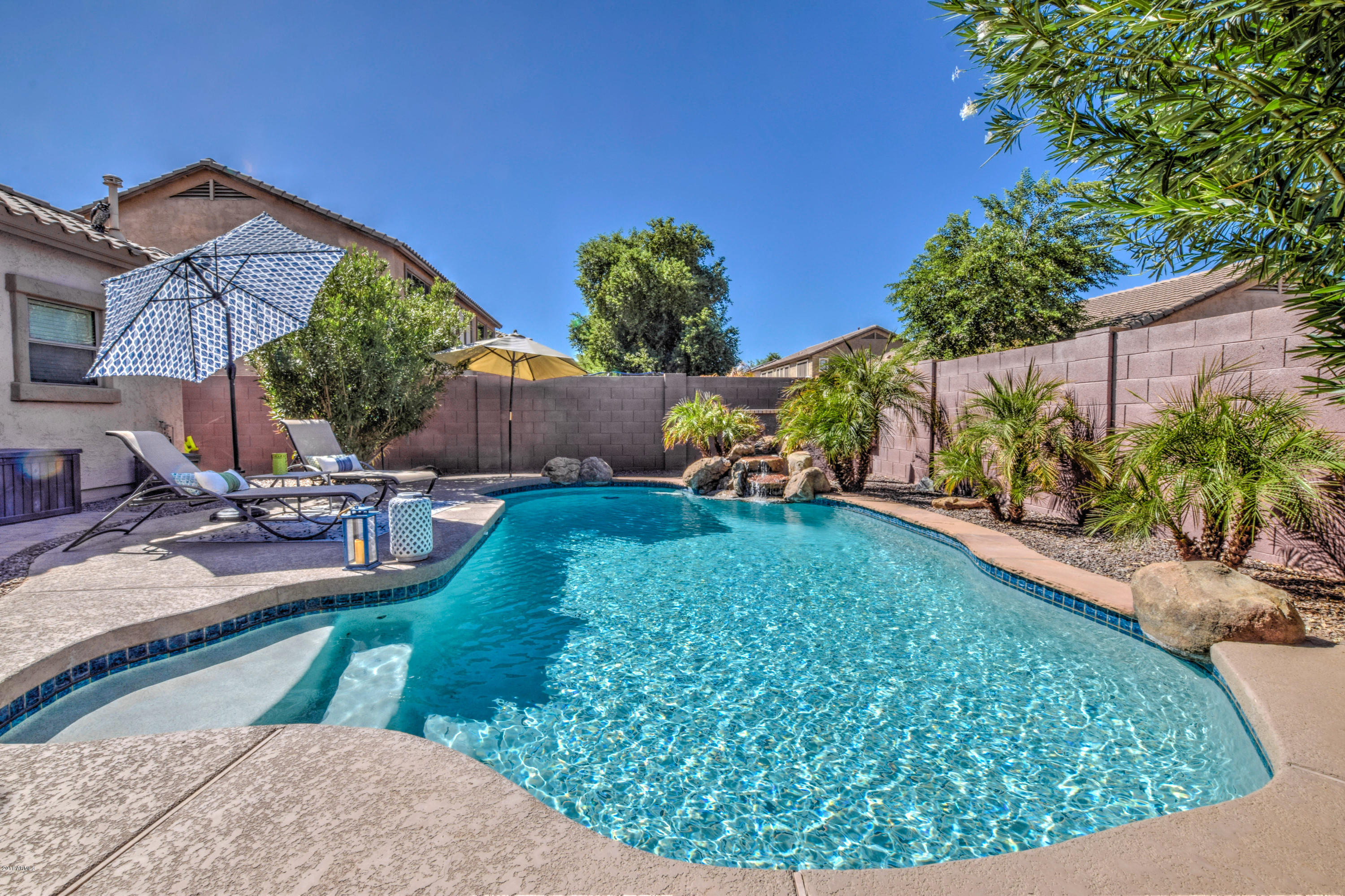 19702 East Thornton Road Queen Creek, AZ 85142 - Photo 67 of 79 a view of a backyard with sitting area