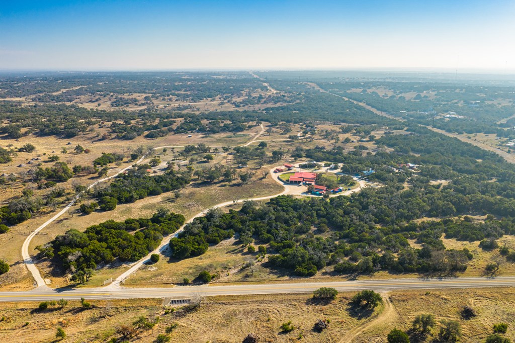 1031 Ranch To Market 479 Mountain Home, TX 78058 - Photo 13 of 22 an aerial view of residential houses with outdoor space
