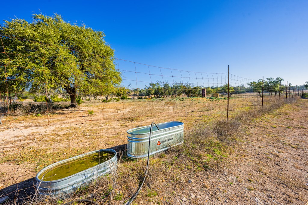 1031 Ranch To Market 479 Mountain Home, TX 78058 - Photo 20 of 22 a view of a lake with a outdoor space