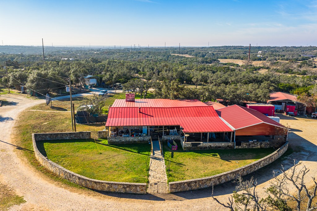 1031 Ranch To Market 479 Mountain Home, TX 78058 - Photo 6 of 22 an aerial view of a swimming pool with outdoor seating