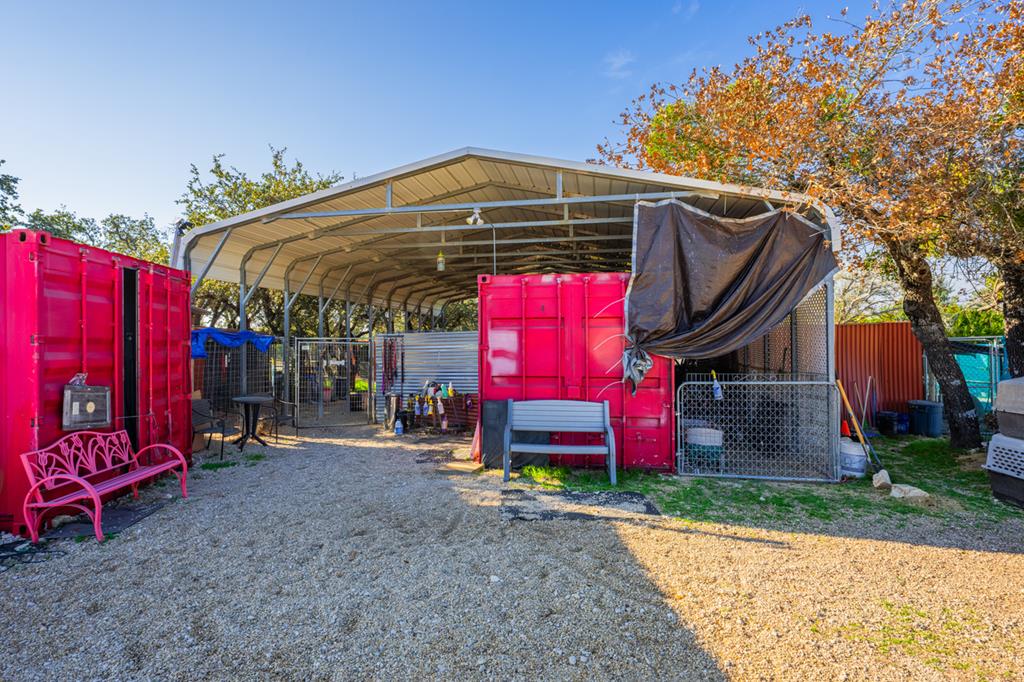 1031 Ranch To Market 479 Mountain Home, TX 78058 - Photo 9 of 22 a view of a chairs and table in the patio