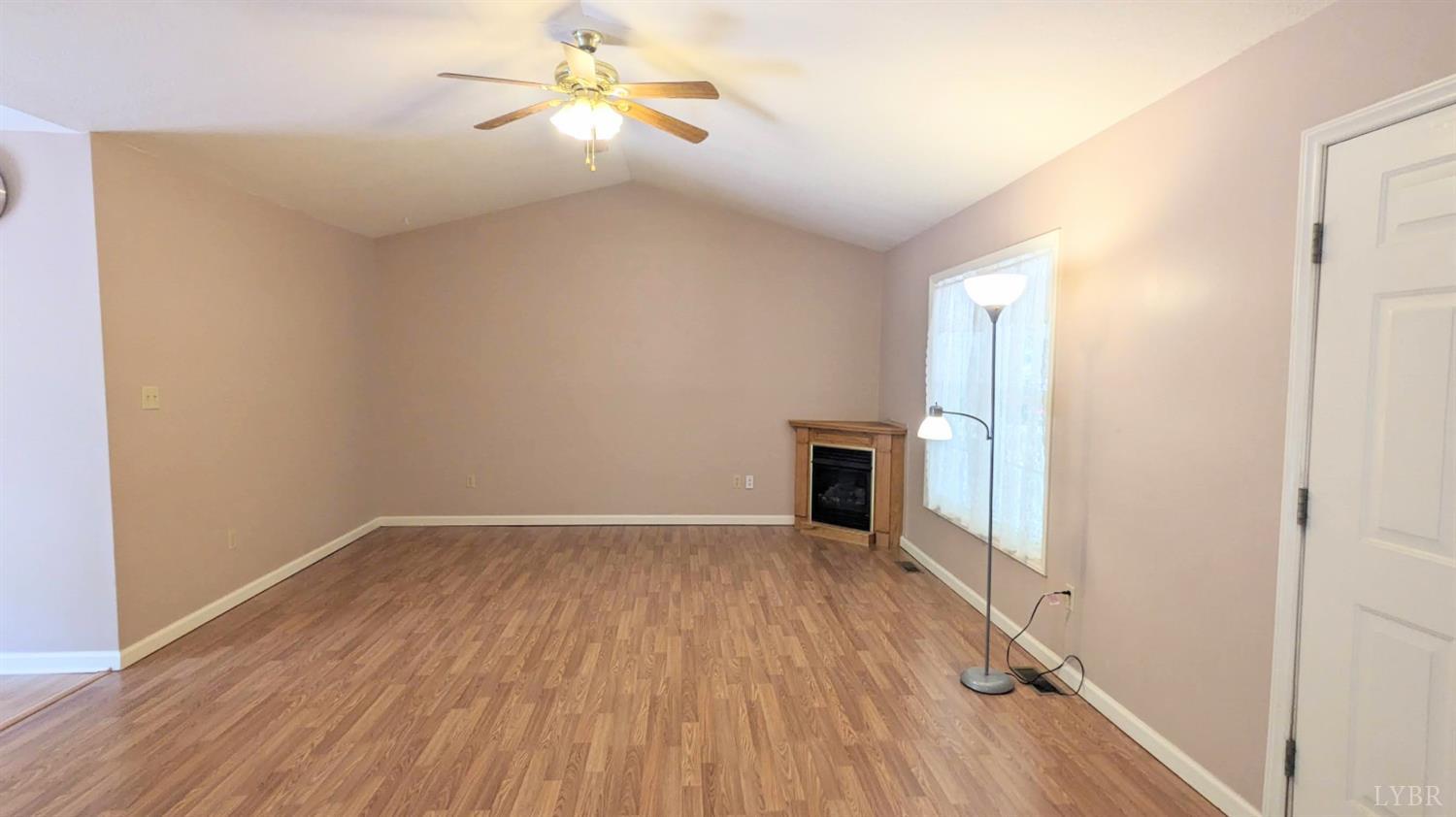 3959 Diamond Hill Road Moneta, VA 24121 - Photo 12 of 50 wooden floor in an empty room with a window