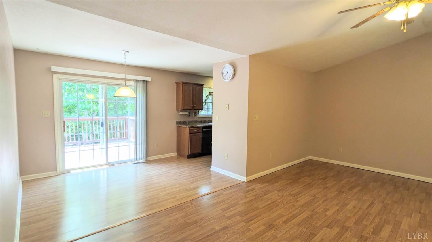 3959 Diamond Hill Road Moneta, VA 24121 - Photo 14 of 50 a view of empty room with wooden floor and fan
