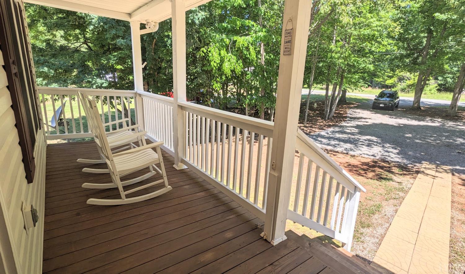 3959 Diamond Hill Road Moneta, VA 24121 - Photo 6 of 50 a view of a chair and tables in the balcony