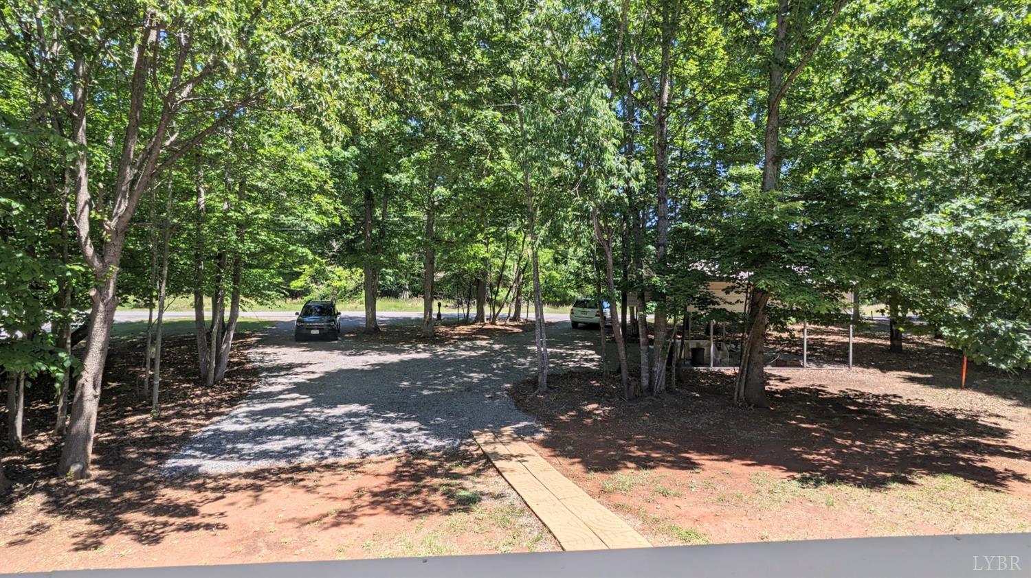3959 Diamond Hill Road Moneta, VA 24121 - Photo 7 of 50 a view of a backyard with trees