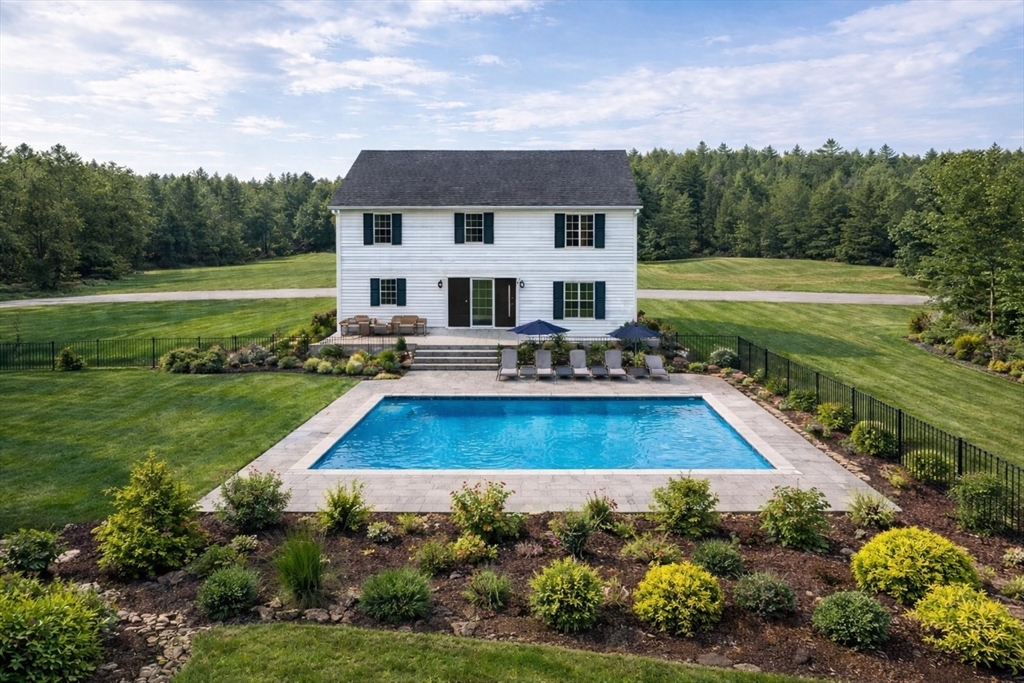 7 Quigley Road Southampton, MA 01073 - Photo 30 of 30 a view of a house with pool and a yard