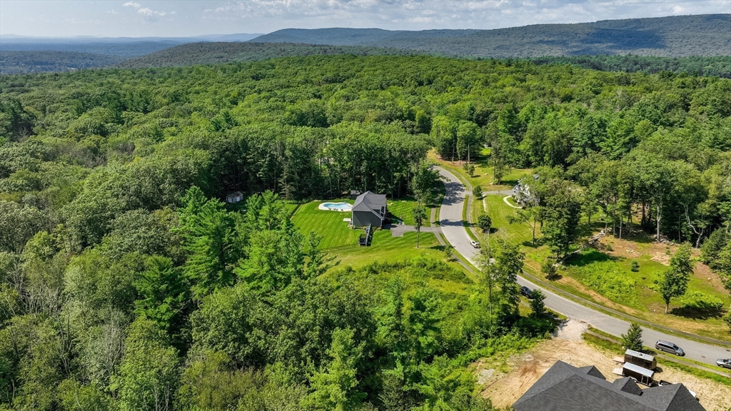 7 Quigley Road Southampton, MA 01073 - Photo 10 of 33 a view of a garden with an outdoor seating