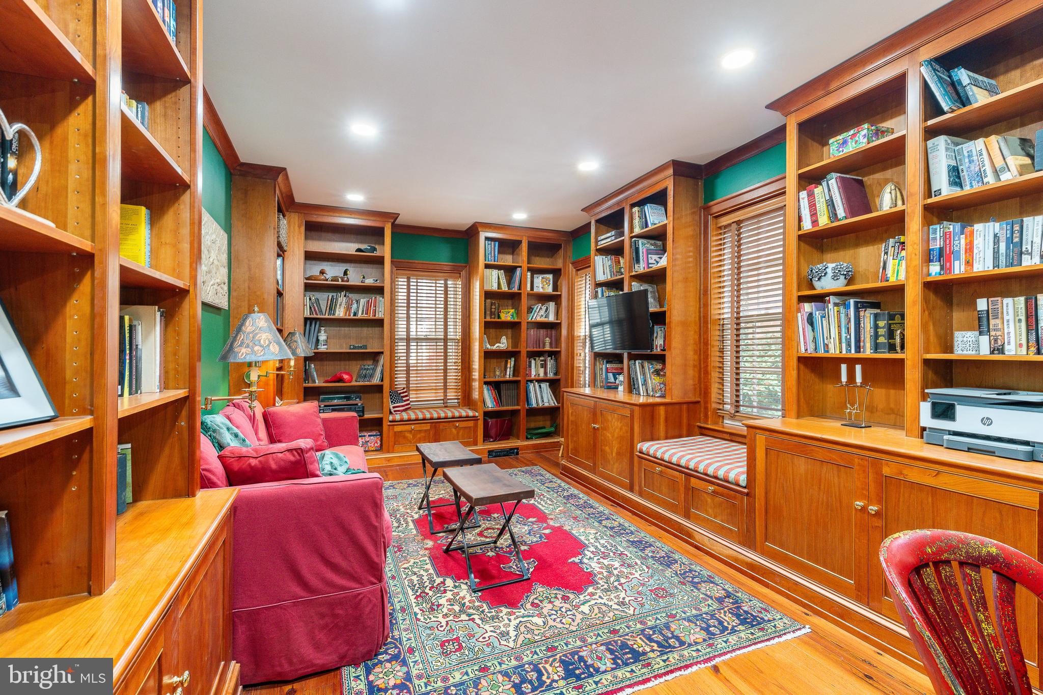 517 Pine Street Philadelphia, PA 19106 - Photo 25 of 63 a living room with furniture a rug and a book shelf