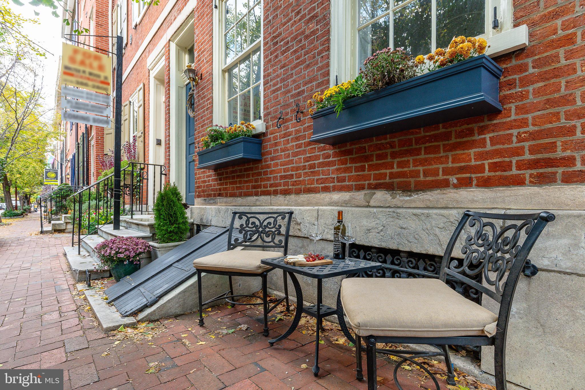 517 Pine Street Philadelphia, PA 19106 - Photo 54 of 63 a backyard of a house with outdoor seating