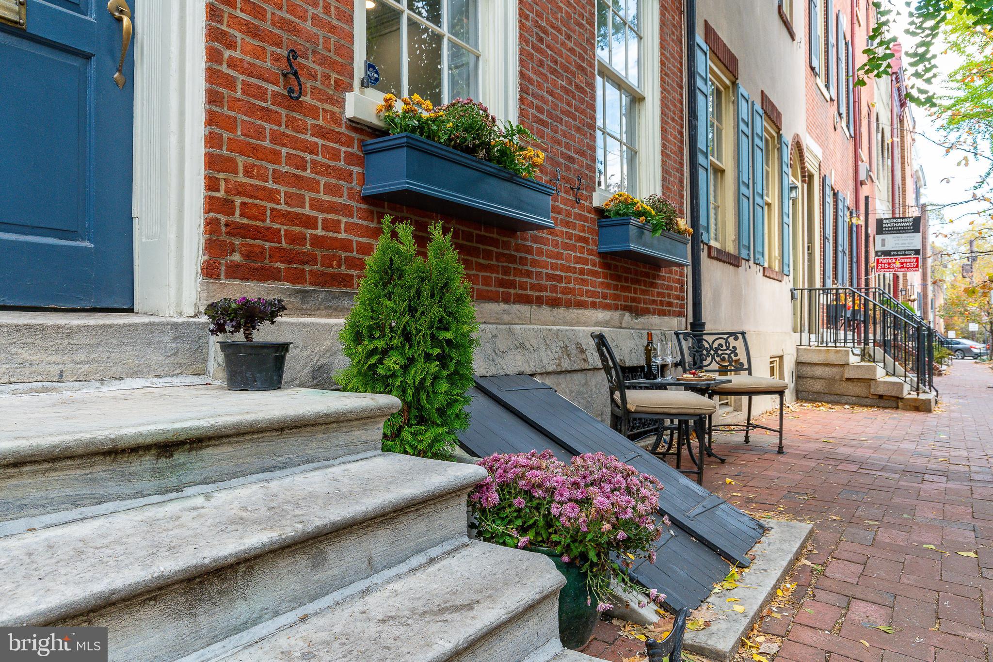 517 Pine Street Philadelphia, PA 19106 - Photo 55 of 63 a view of a bench sitting in back yard of a building