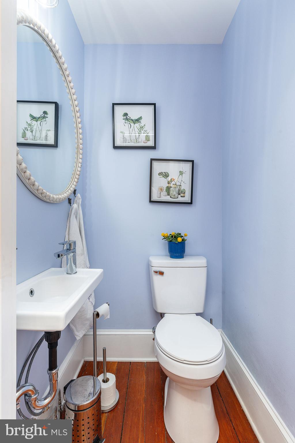 517 Pine Street Philadelphia, PA 19106 - Photo 8 of 63 a bathroom with a toilet a sink and a mirror
