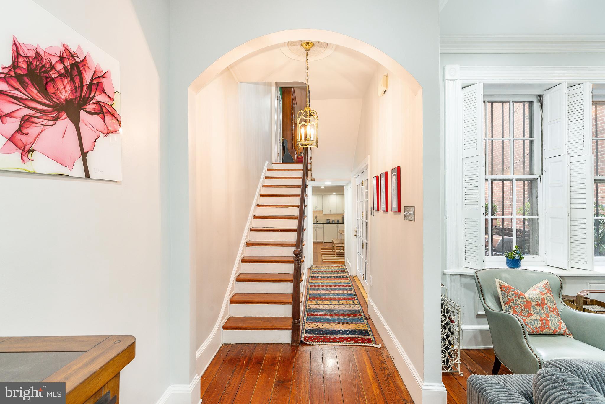 517 Pine Street Philadelphia, PA 19106 - Photo 10 of 63 a view of a hallway with wooden floor and entryway