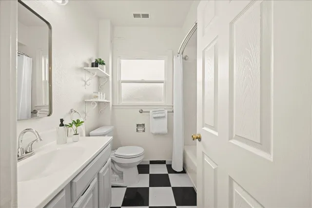 a outdoor living space with furniture and a potted plant