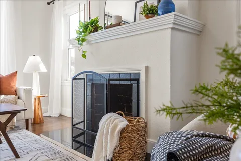 a view of balcony with furniture