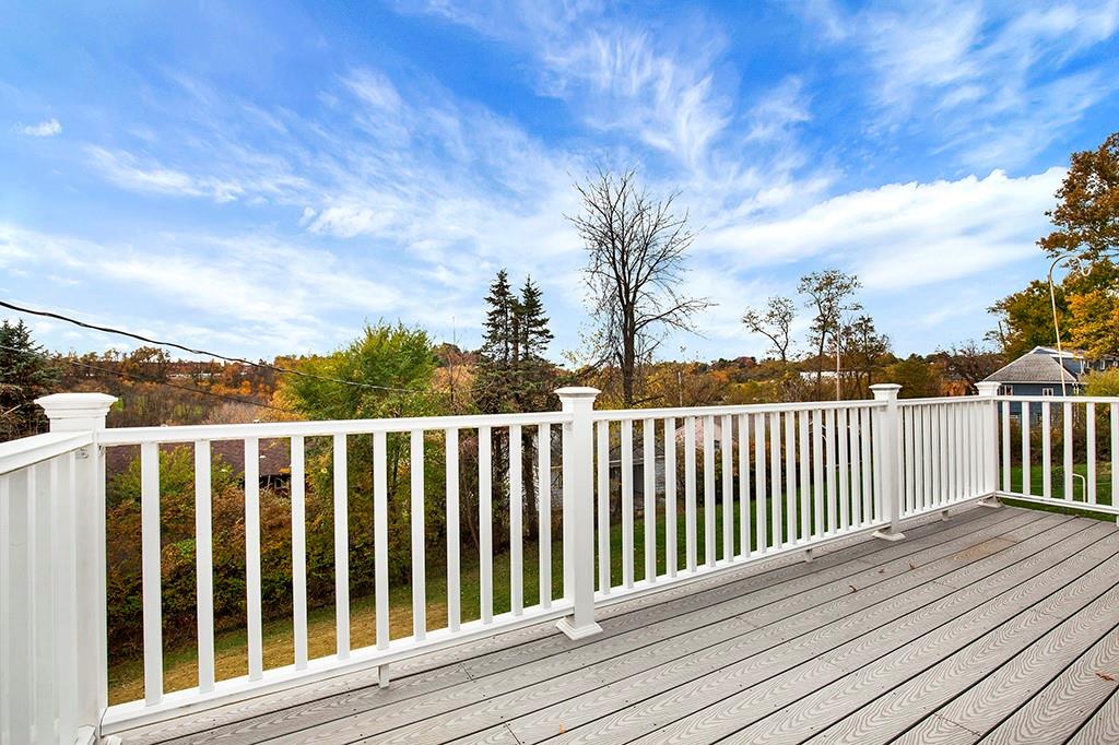 10970 Old Trail Road Irwin, PA 15642 - Photo 13 of 20 a balcony with wooden floor and fence