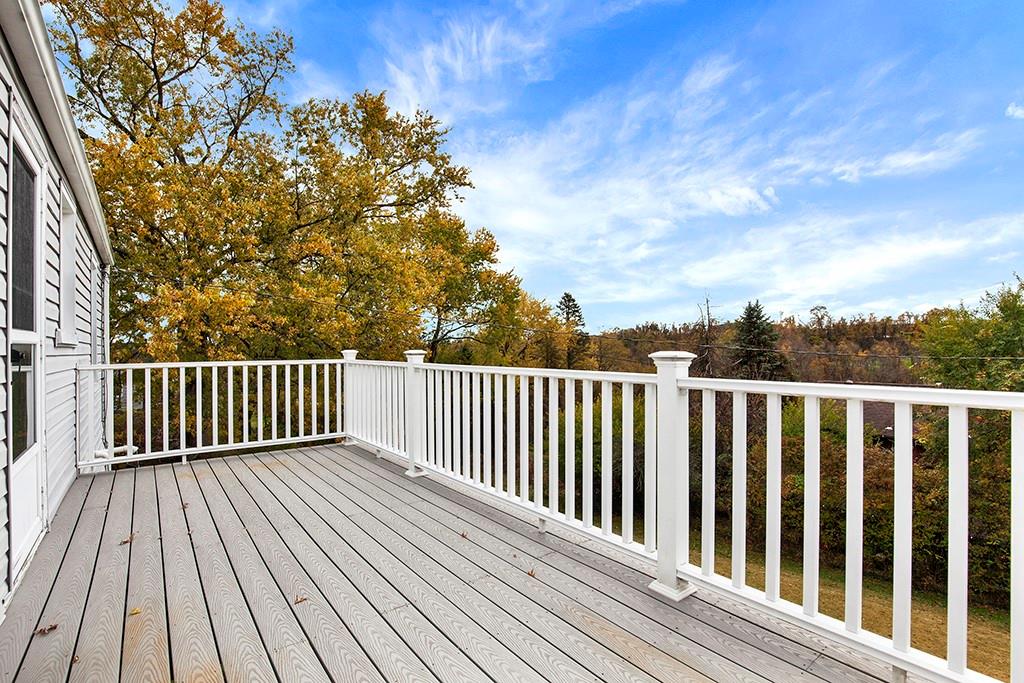 10970 Old Trail Road Irwin, PA 15642 - Photo 14 of 20 a balcony with wooden floor and fence