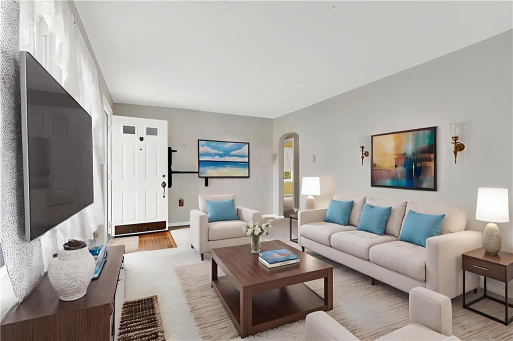 10970 Old Trail Road Irwin, PA 15642 - Photo 5 of 20 a living room with furniture and a flat screen tv