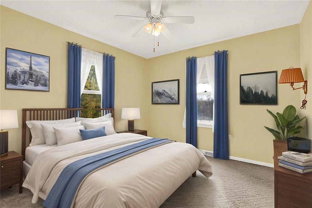 10970 Old Trail Road Irwin, PA 15642 - Photo 7 of 20 a bedroom with a large bed and a chandelier