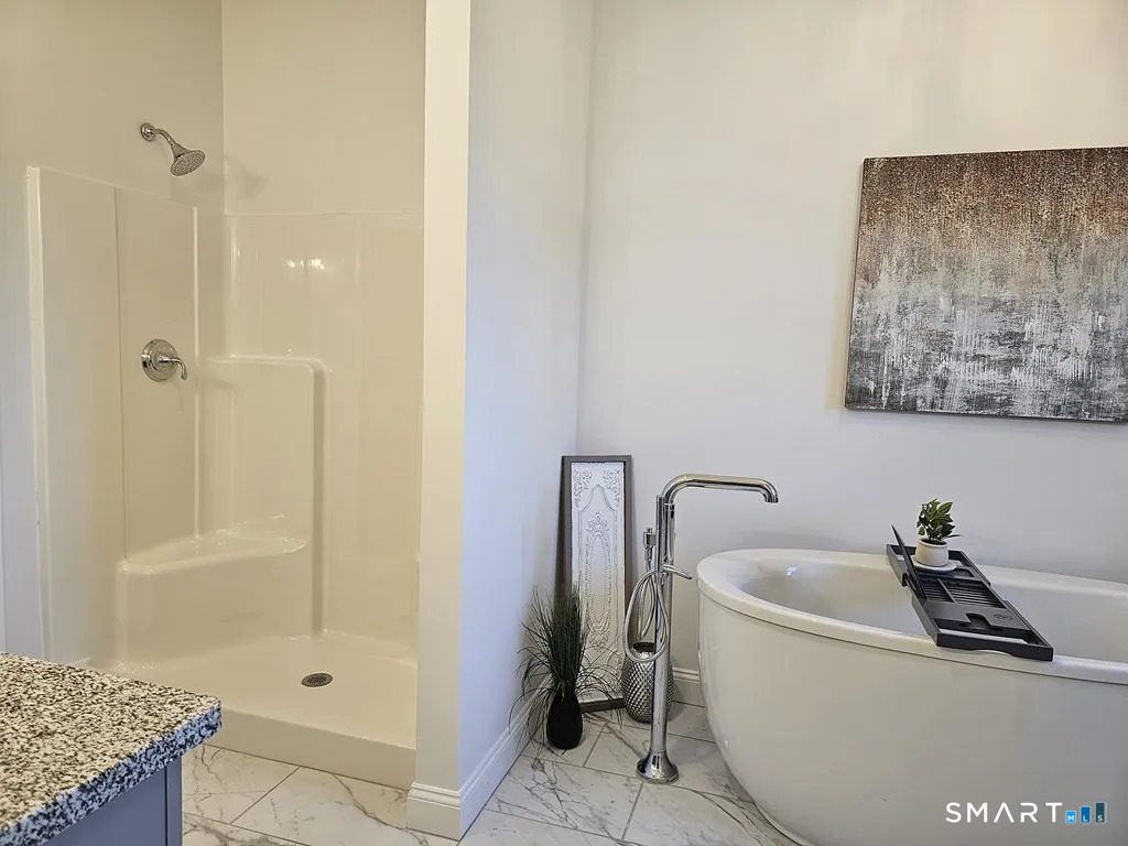 80 Aldrich Road Putnam, CT 06260 - Photo 15 of 23 a bathroom with a bathtub and shower