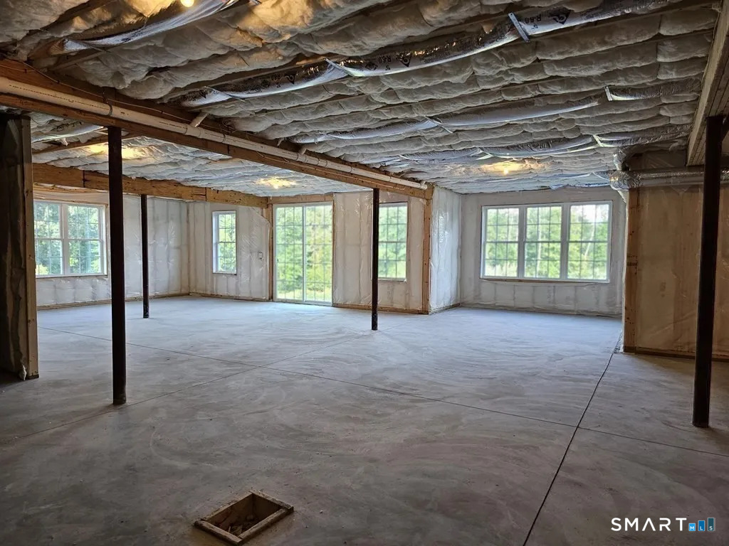 80 Aldrich Road Putnam, CT 06260 - Photo 21 of 23 a view of an empty room with a fireplace